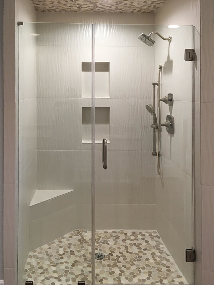 Sliced Tan and White Pebble Tile Shower Pan and Ceiling