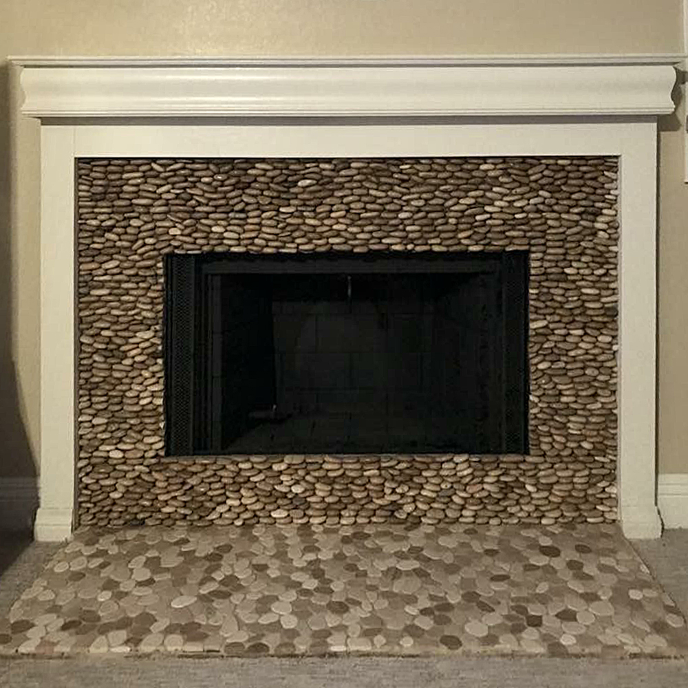 Tan Pebble Tile Fireplace and Hearth
