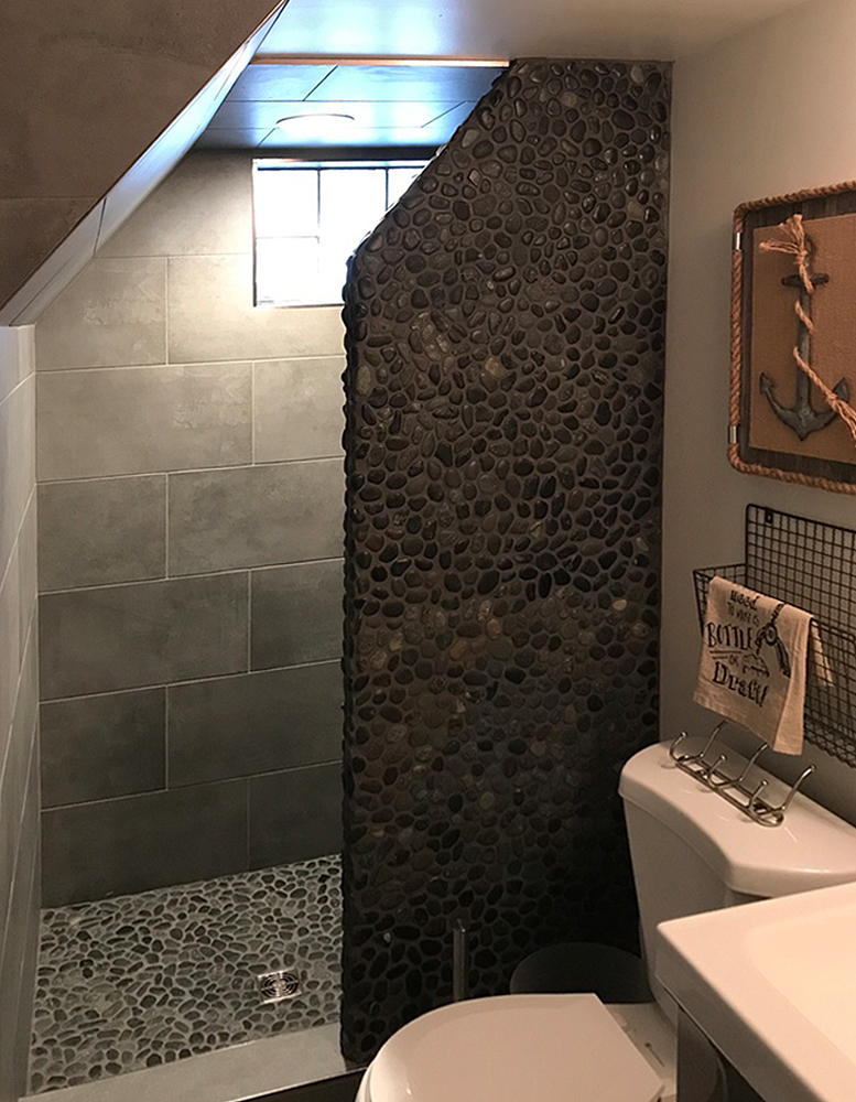 Black Pebble Tile Shower Floor and Wall