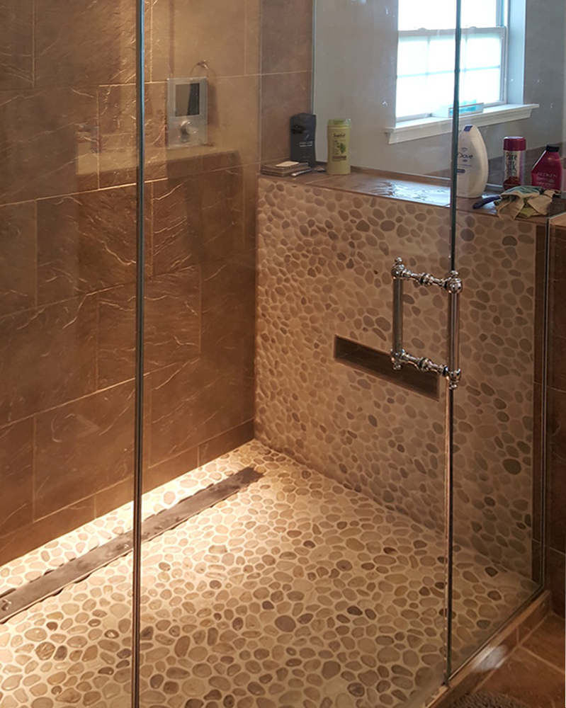 bali cloud pebble tile bathroom flooring and shower