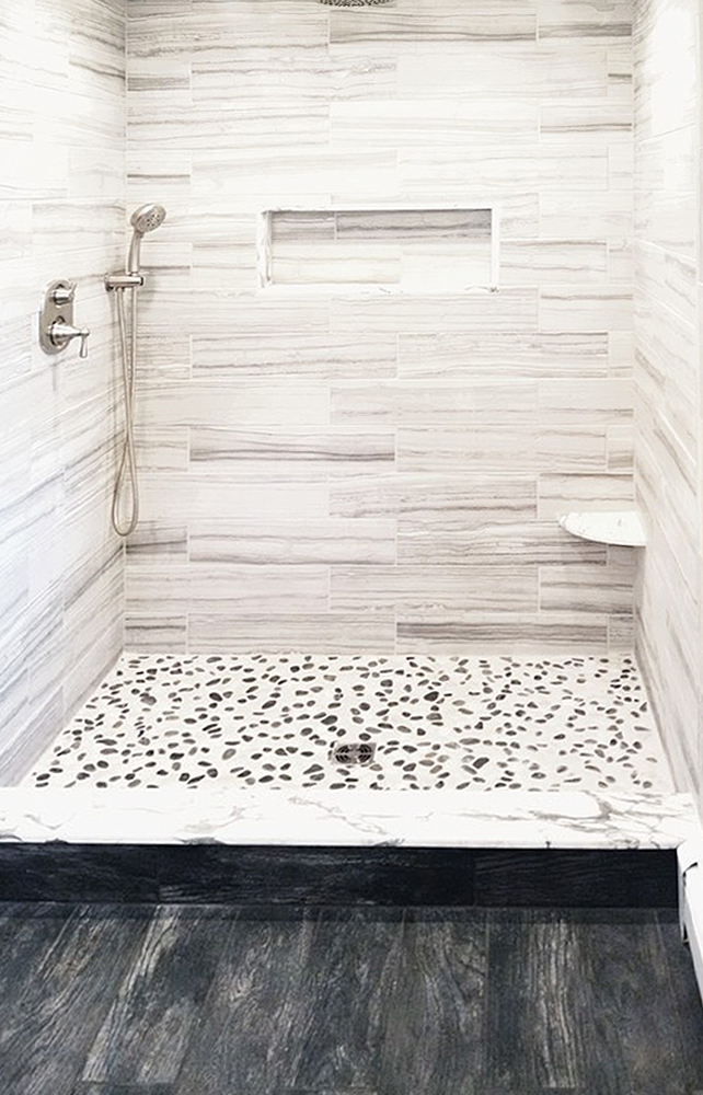 Black and White Pebble Tile Shower Pan
