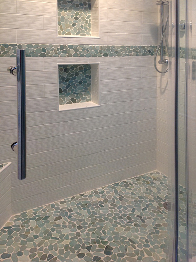 Sliced Sea Green Pebble Tile Shower Floor and Niche