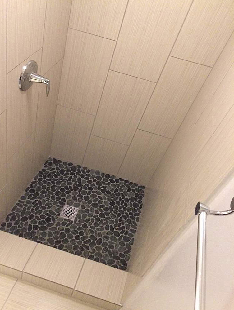 Sliced Charcoal Black Pebble Tile Shower Floor