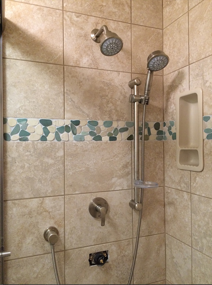 sliced-green-and-white-peeble-tile-border-shower-accent