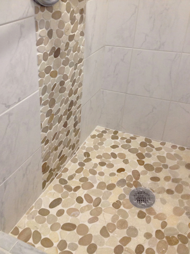 Sliced Java Tan and White Pebble Tile Shower Waterfall