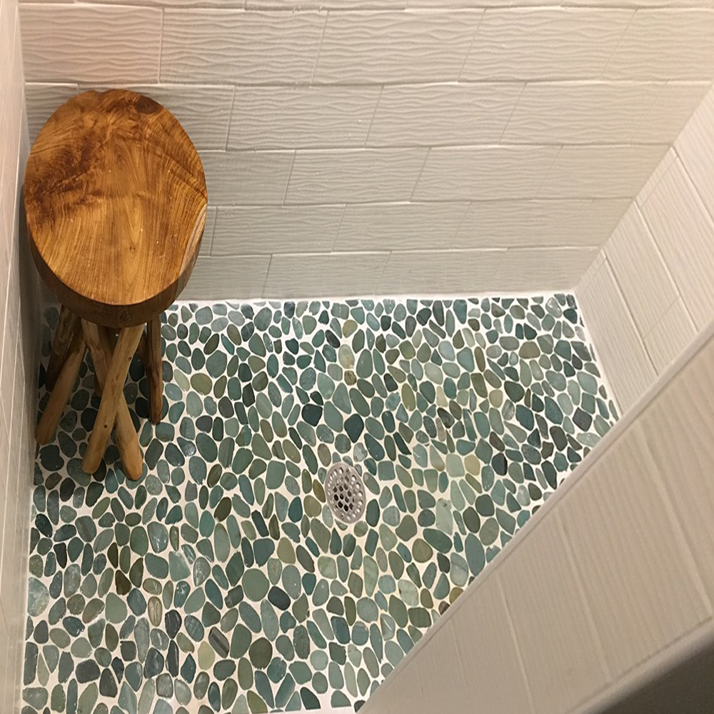 Sliced Sea Green Pebble Tile Shower Flooring