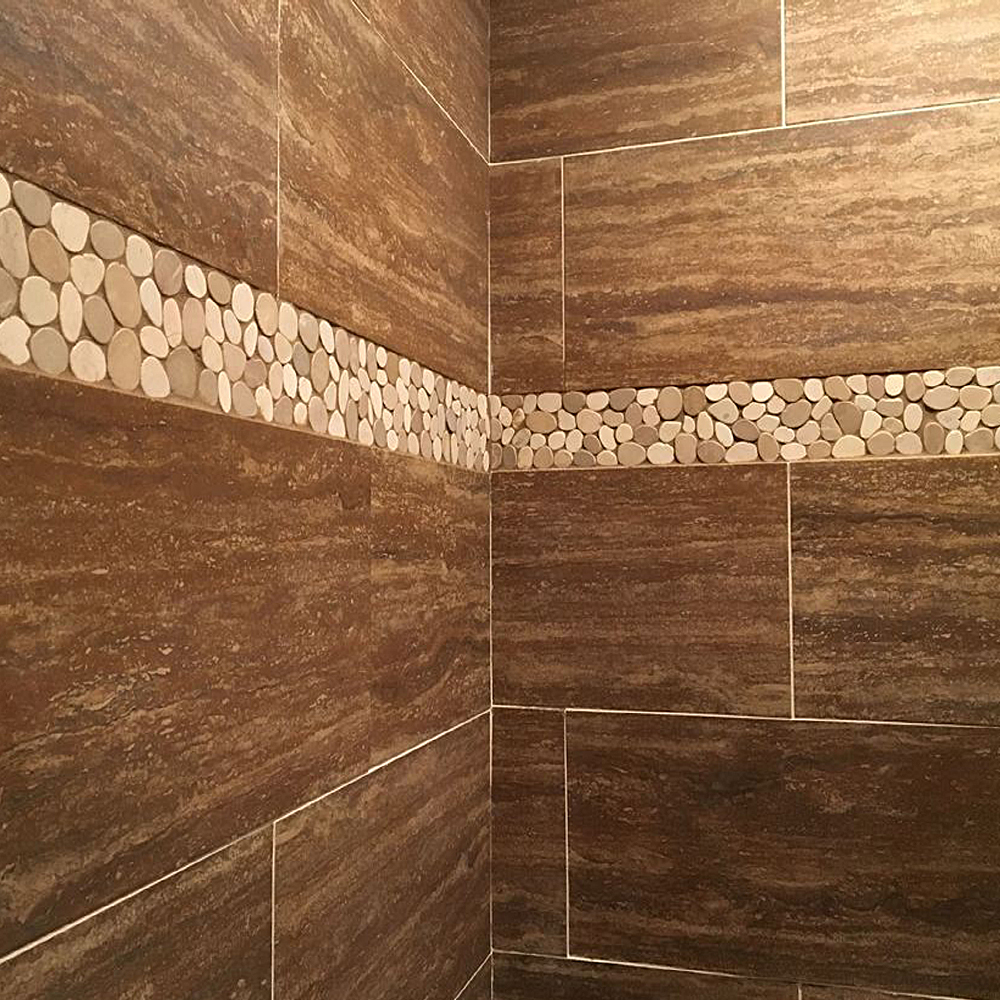 Sliced Tan and White Pebble Border Shower Accent