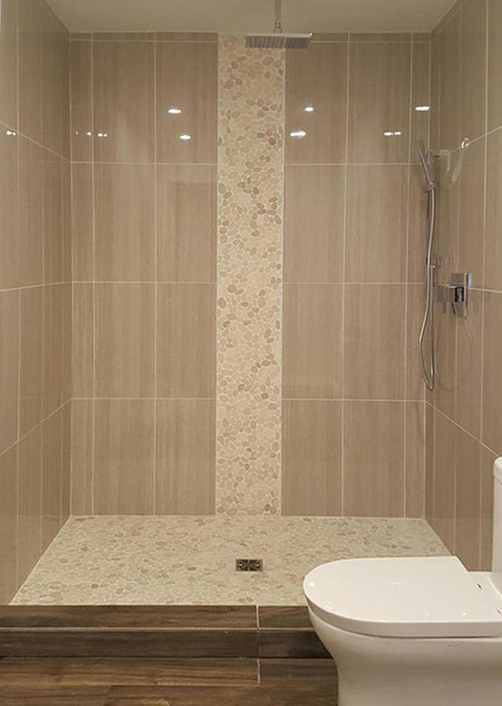 Sliced White Pebble Tile Luxury Shower