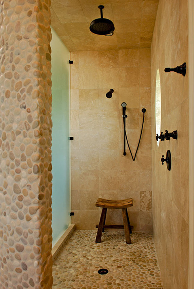 tan-and-white-pebble-tile-shower-floor-and-accent