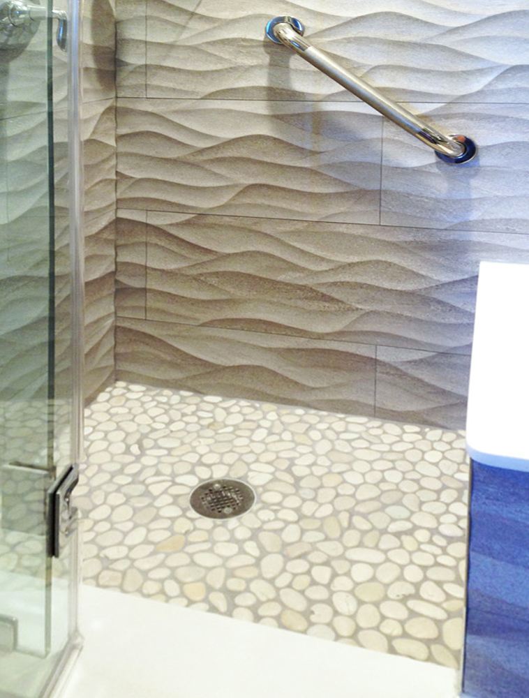 White Pebble Tile Shower Floor with Textured Walls